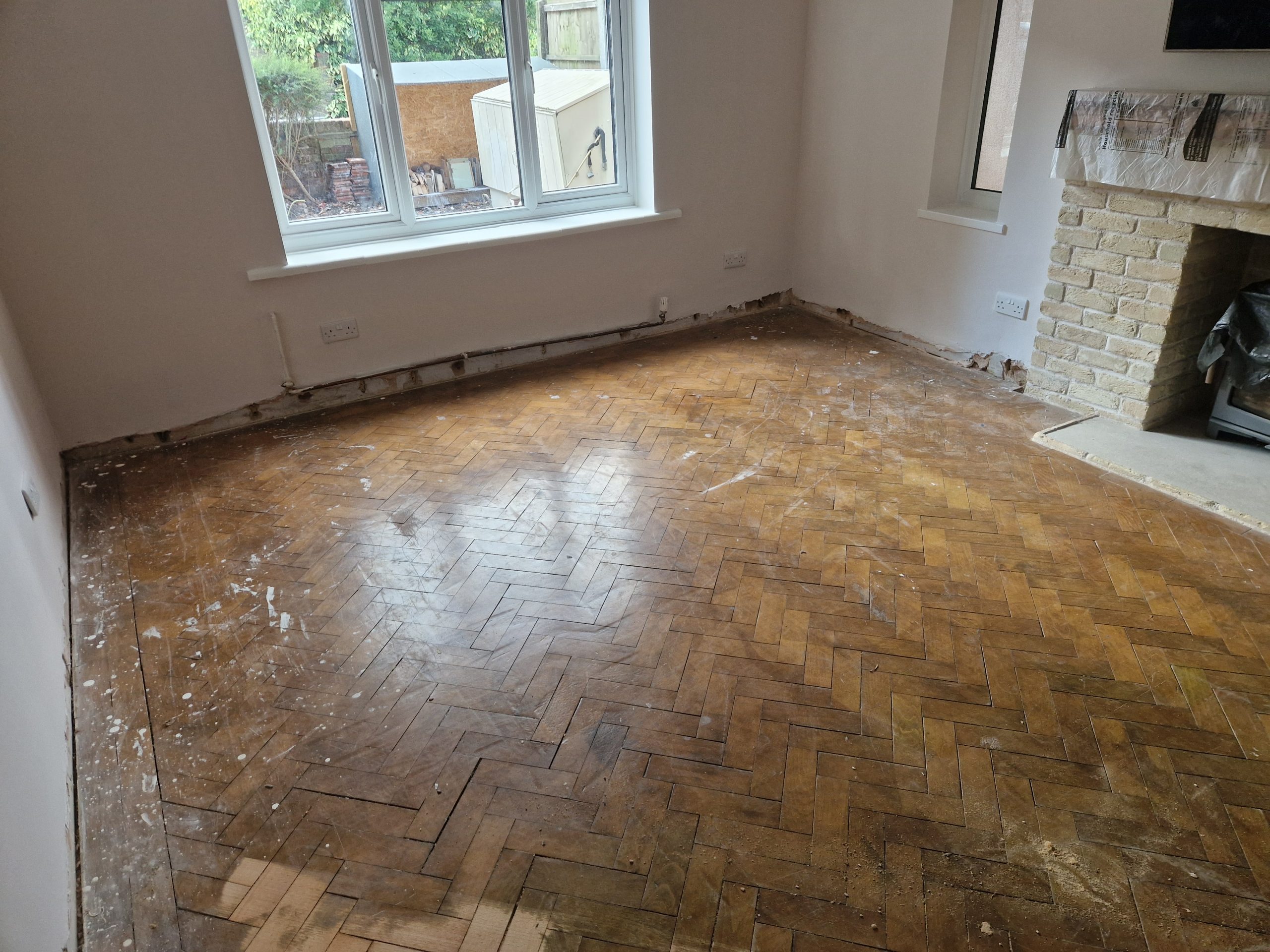 heritage-parquet-isleworth-herringbone-parquet-wood-floor-pre-restoration