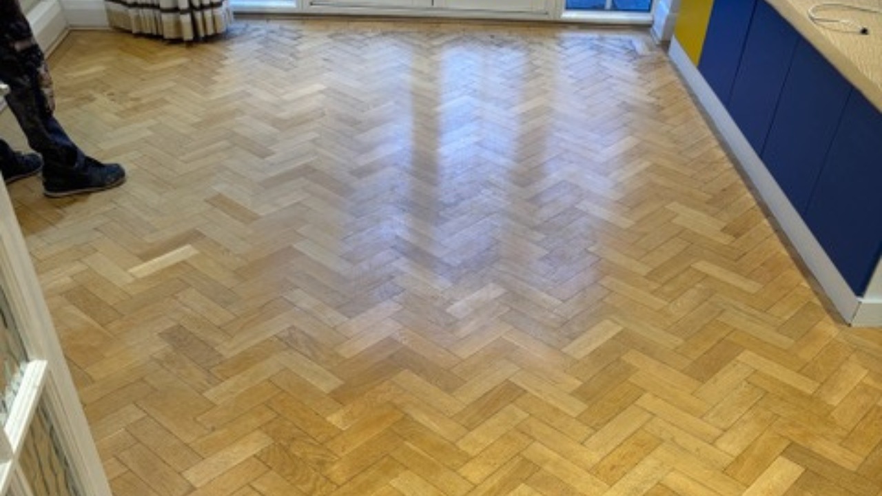 Parquet Floor Sanding in Isleworth on a light oak herringbone parquet kitchen floor, restored to a smooth, even sheen.